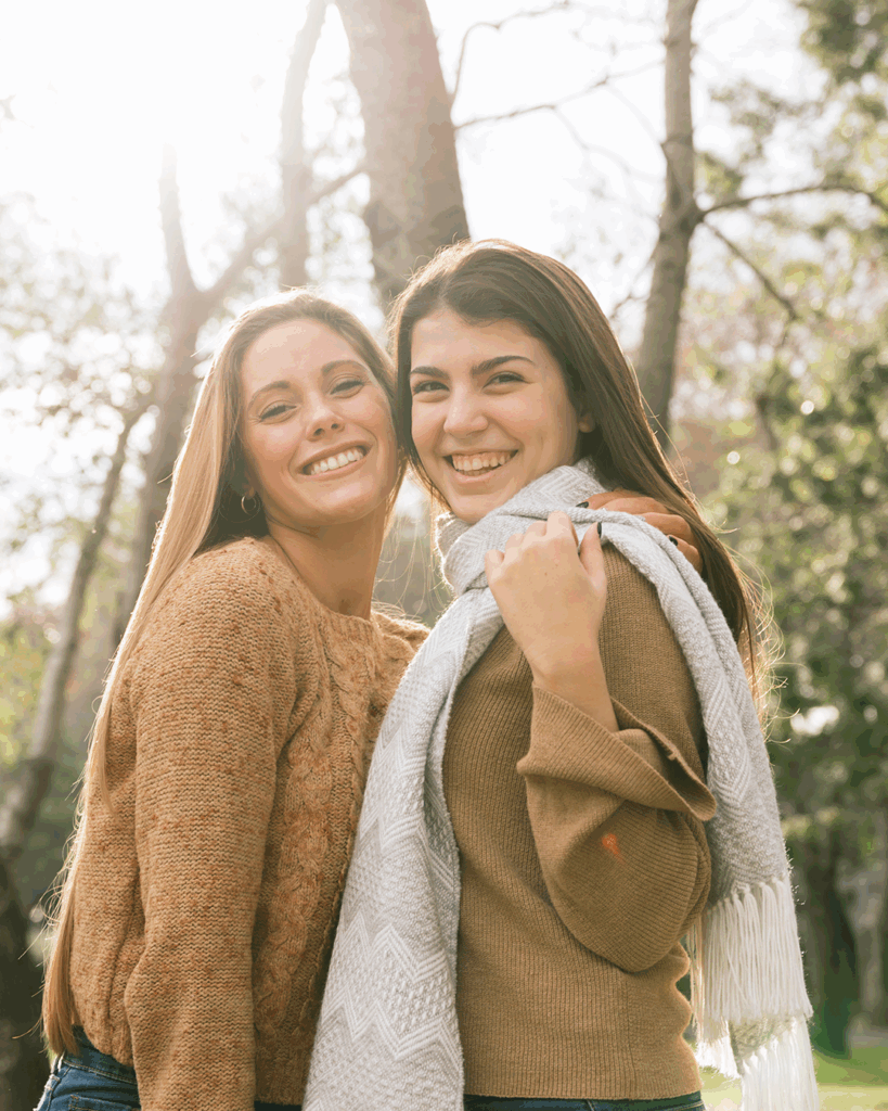 medium-shot-two-women-smiling-park